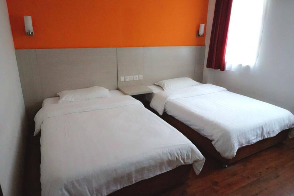 My Hotel Qingdao Room photo